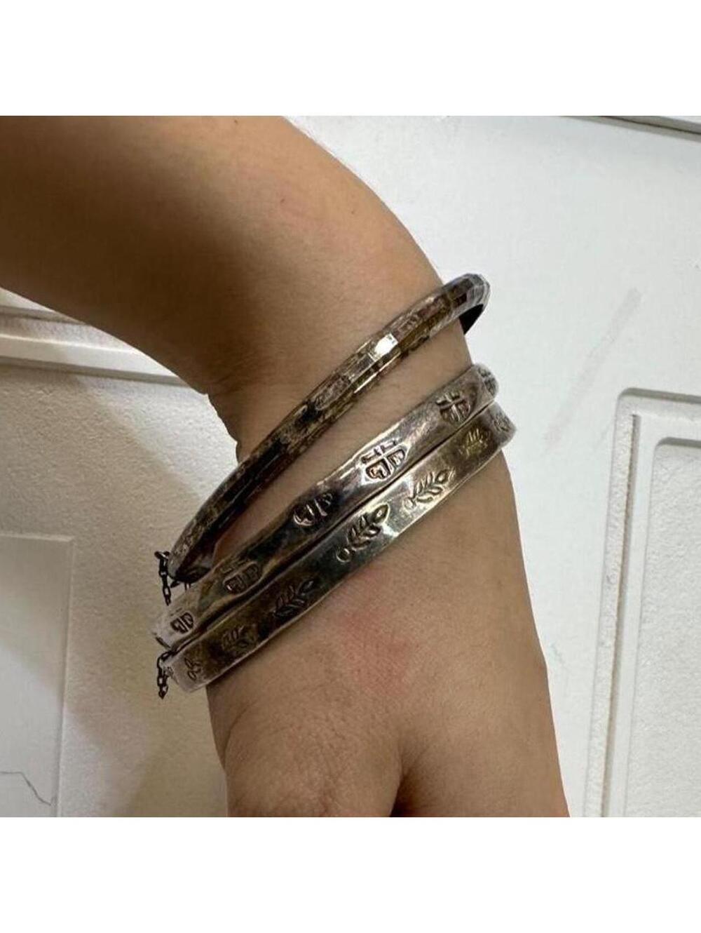 90s vintage silver bangles with engraved designs 1cm wide.